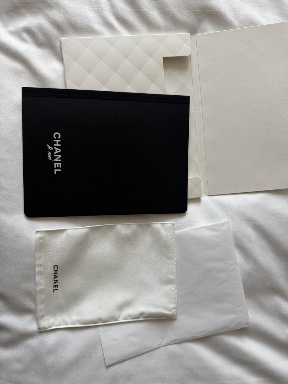 CHANEL Black Magazine with White pouch